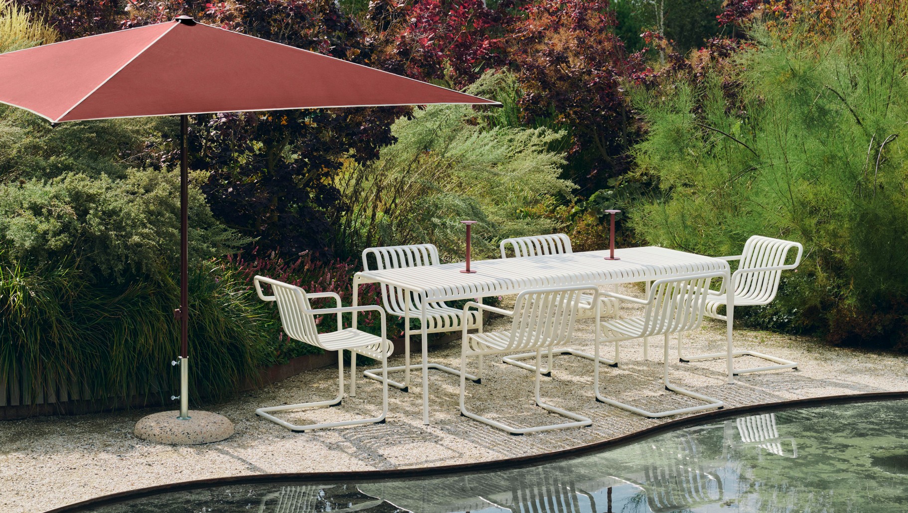 Terrazza Parasol Square off-white and burgundy_Palissade Cantilever Dining Armchair_Palissade Table L220 cream white_Host Portable Lamp